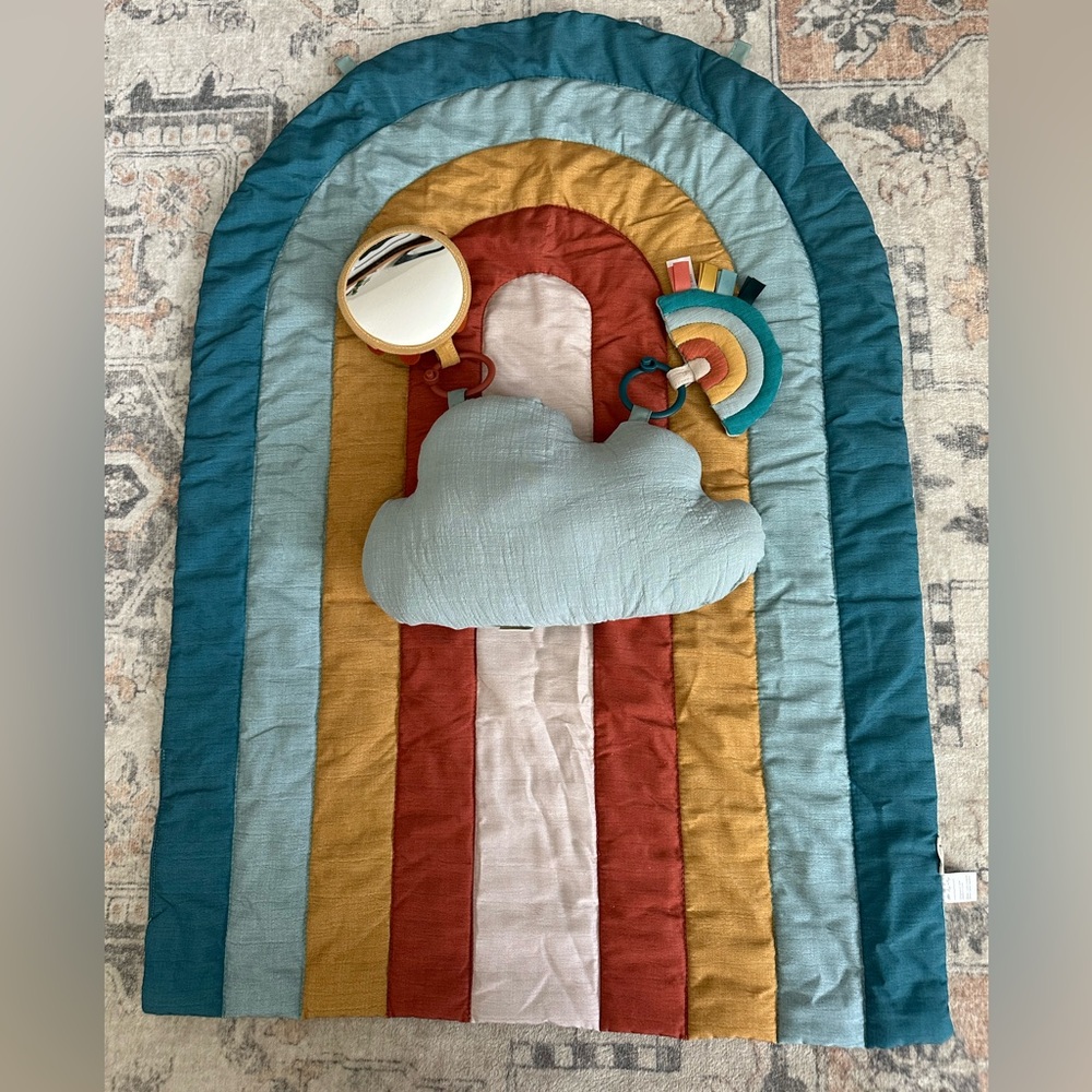 Itzy Ritzy Rainbow Play Mat in Teal, Mustard, Rust, Light Blue